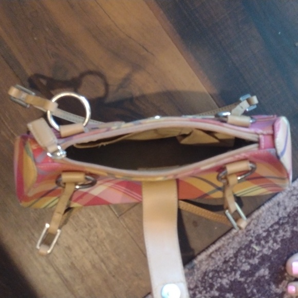 This is an adorable small tan/multicolored purse. - Picture 3 of 4